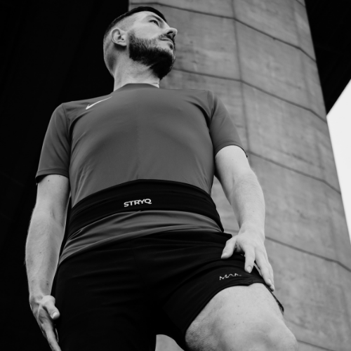 Running belt race day setup with gels and phone