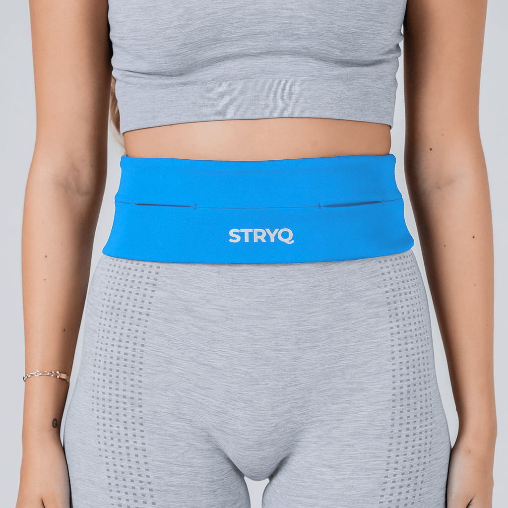 woman wearing STRYQ RUNNING BELT