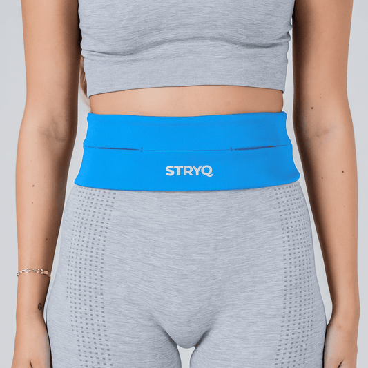 woman wearing STRYQ RUNNING BELT