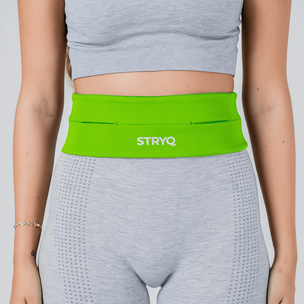 Woman wearing the stryq green waist pack