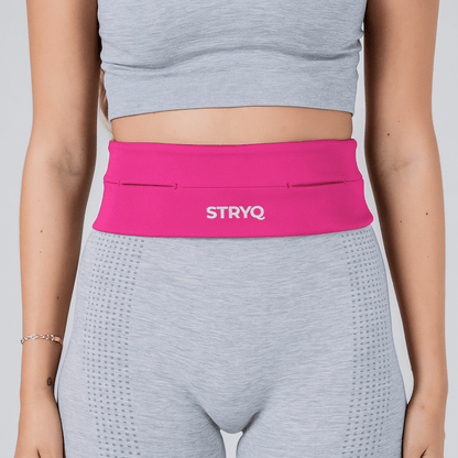 Woman wearing STRYQ RUNNING BELT