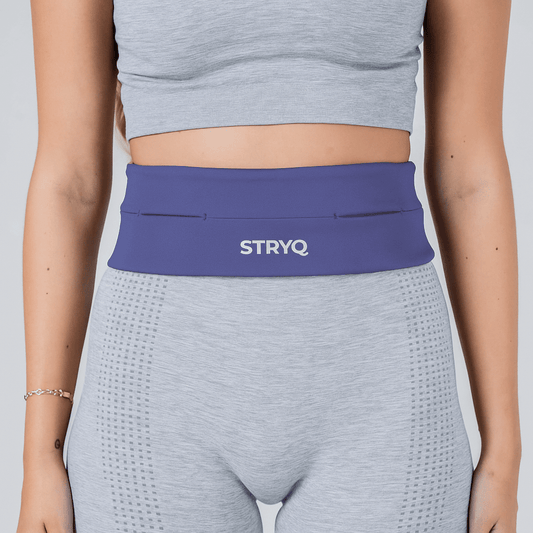 woman wearing STRYQ RUNNING BELT